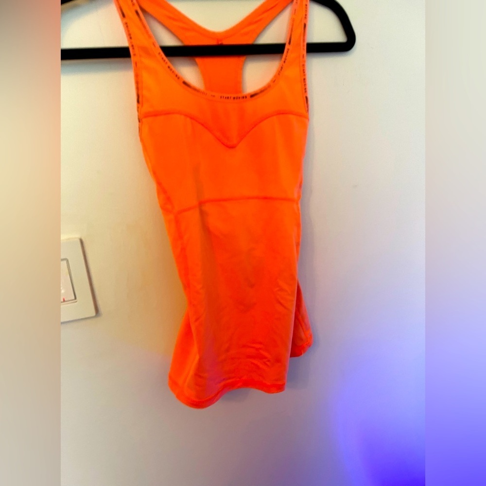 Start Moving Waist-Length Racerback Tank Top